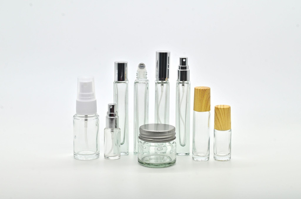 custom glass perfume bottles and cosmetic packaging containers with spray, roller and jar options